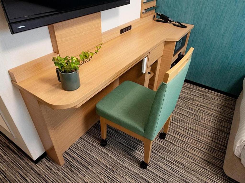 TV a/nebo společenská místnost v ubytování Nest&Rise Osaka Namba Hotel