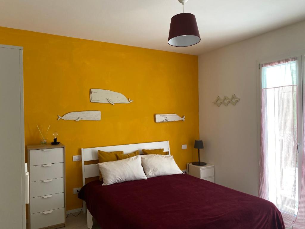 Posteľ alebo postele v izbe v ubytovaní Lupicante 56 Cesenatico