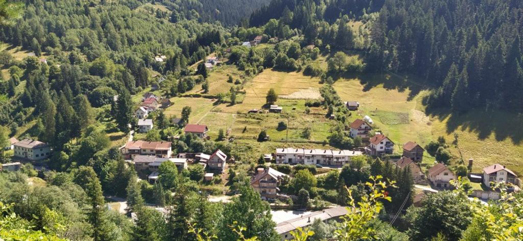 an aerial view of a small village in the mountains at Vareš in Vareš