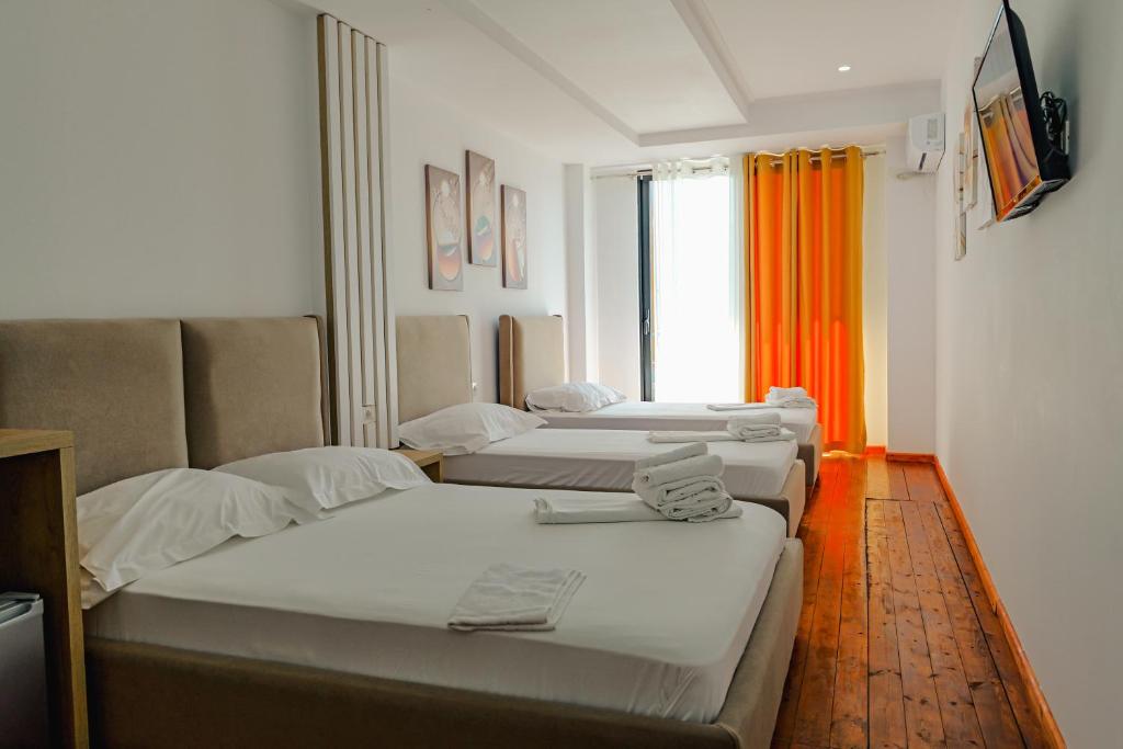 Postel nebo postele na pokoji v ubytování Hotel Summer
