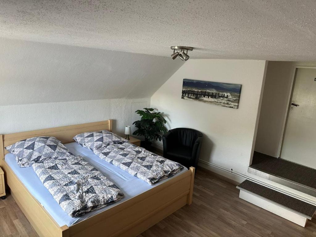 Ein Bett oder Betten in einem Zimmer der Unterkunft Zentrale Doppelbettzimmer