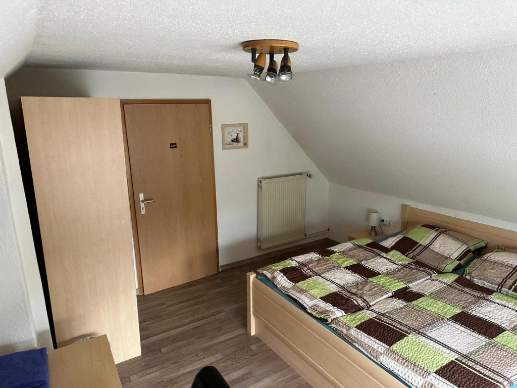 Ein Bett oder Betten in einem Zimmer der Unterkunft Zentrale Doppelbettzimmer
