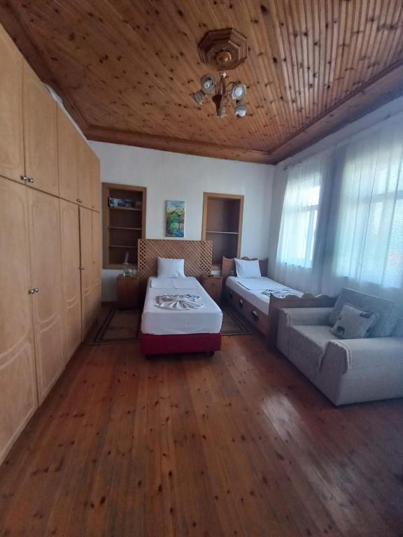Letto o letti in una camera di MiziriGuestHouse