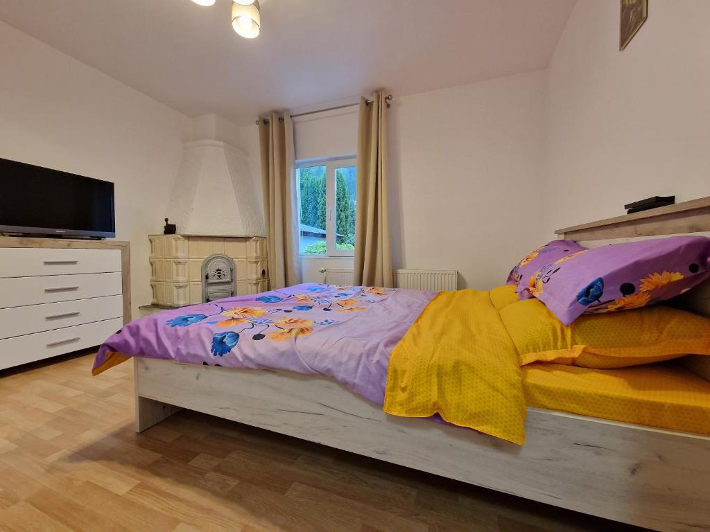 Postel nebo postele na pokoji v ubytování Sabina's Cozy House