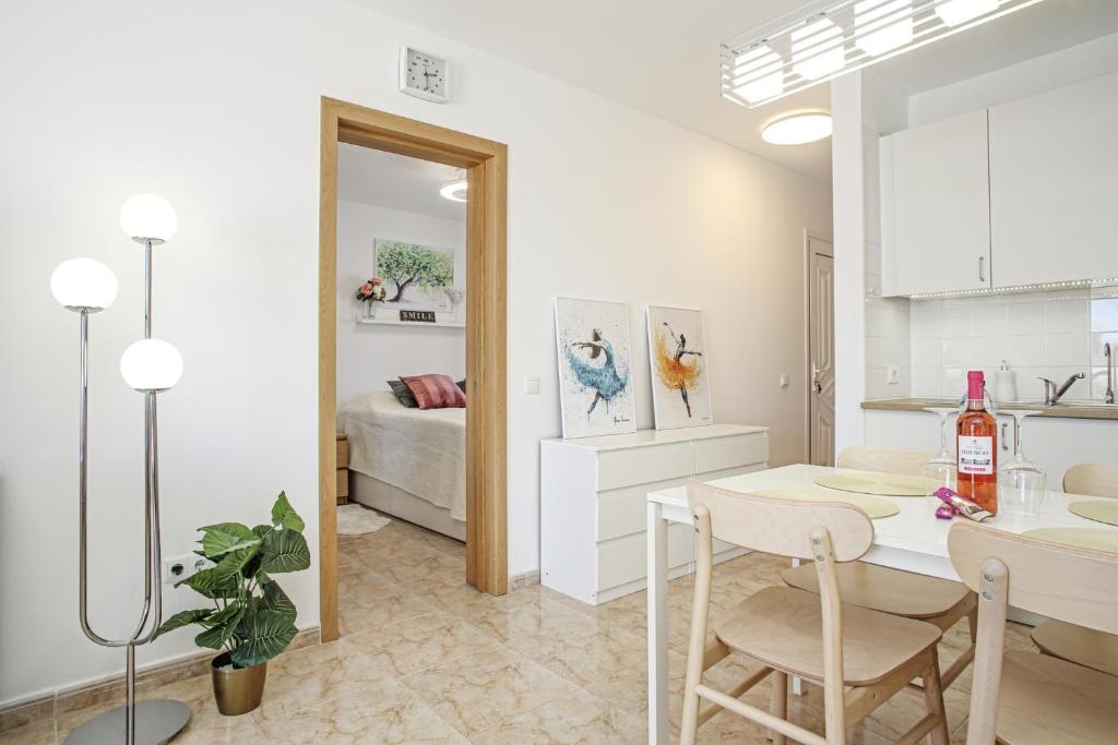 Kuchyň nebo kuchyňský kout v ubytování Sand Club Apartment 202