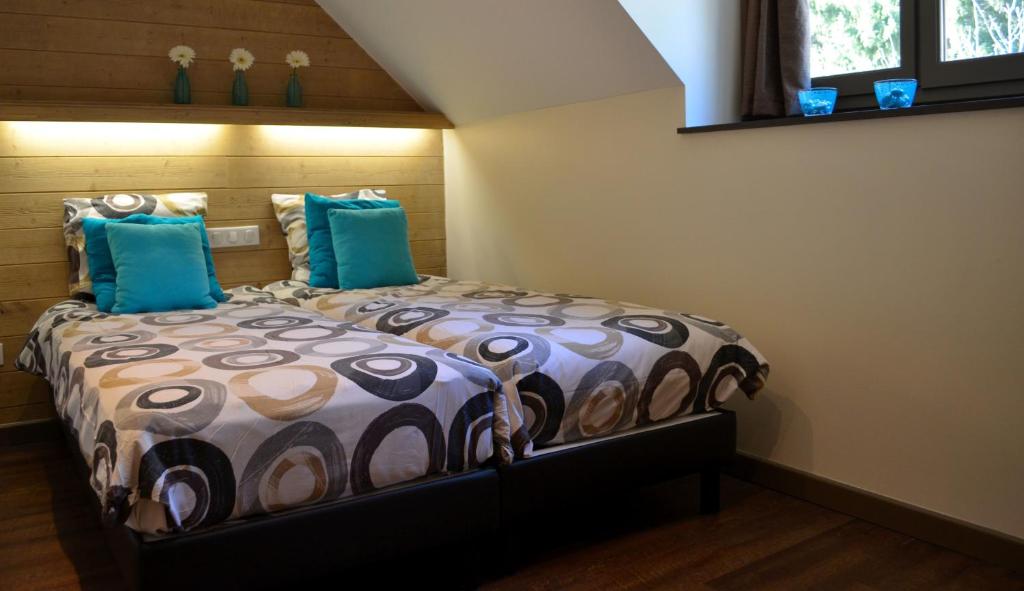 Postel nebo postele na pokoji v ubytování Auberge La Douce Montagne
