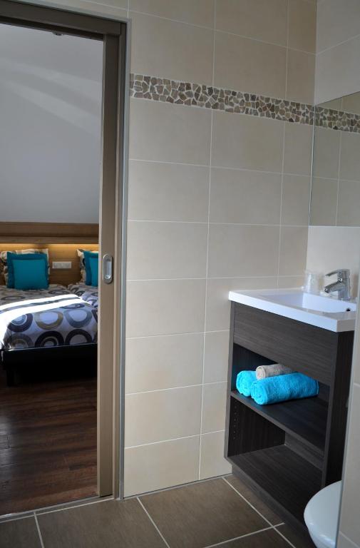 Postel nebo postele na pokoji v ubytování Auberge La Douce Montagne