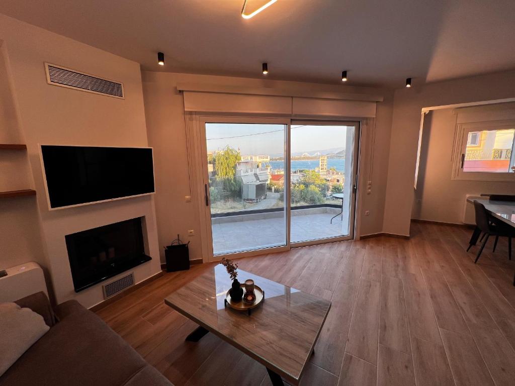 TV a/nebo společenská místnost v ubytování Elia Luxury Residence