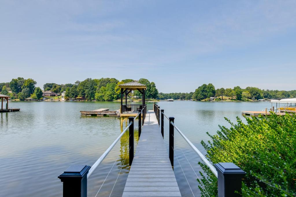 a dock with a gazebo on a lake at Spacious Lake Norman Retreat with Private Dock! in Sherrills Ford