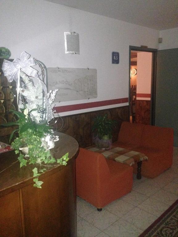 Posezení v ubytování Hotel Scandola