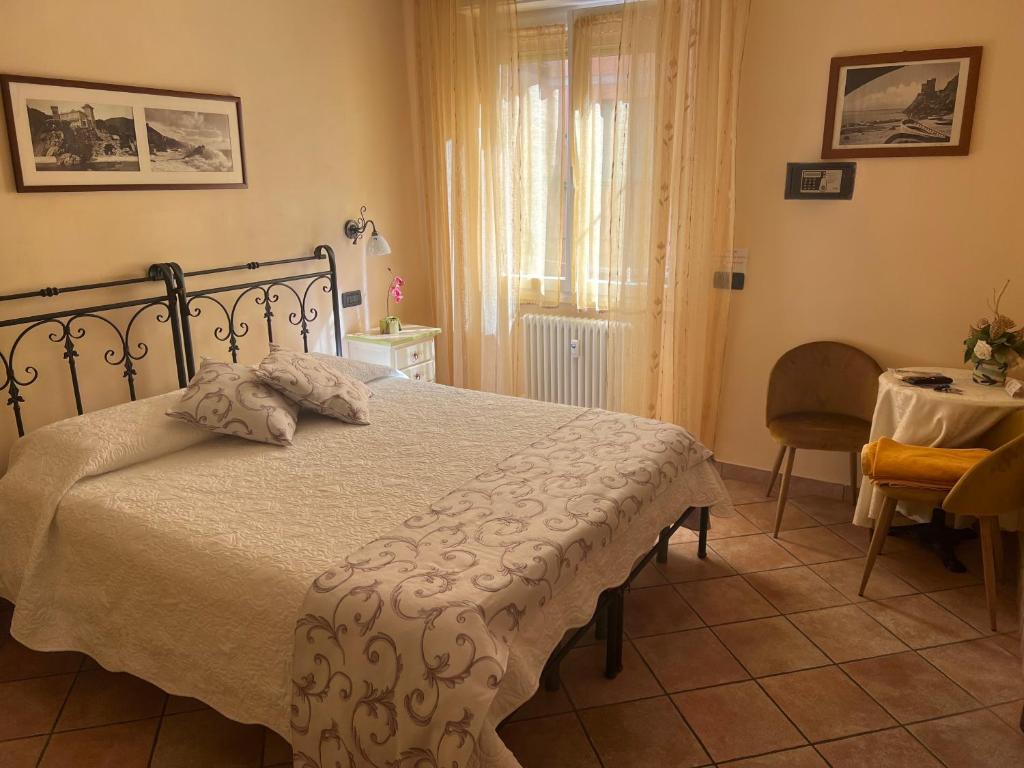 Postel nebo postele na pokoji v ubytování Il Timone Loreto