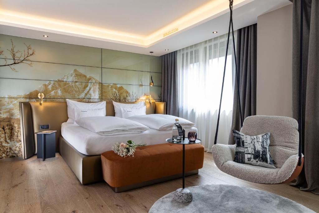 Posteľ alebo postele v izbe v ubytovaní Hotel Innsbruck