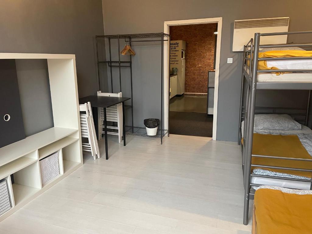 Postel nebo postele na pokoji v ubytování Pokoje Gościnne FRESCO