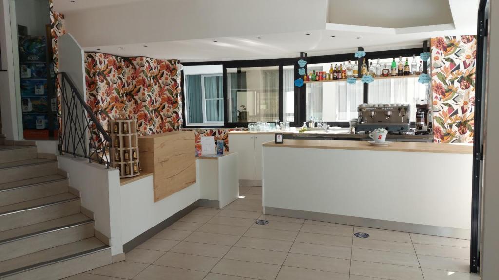 Kuchyň nebo kuchyňský kout v ubytování Hotel Clipper