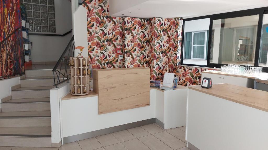 Kuchyň nebo kuchyňský kout v ubytování Hotel Clipper