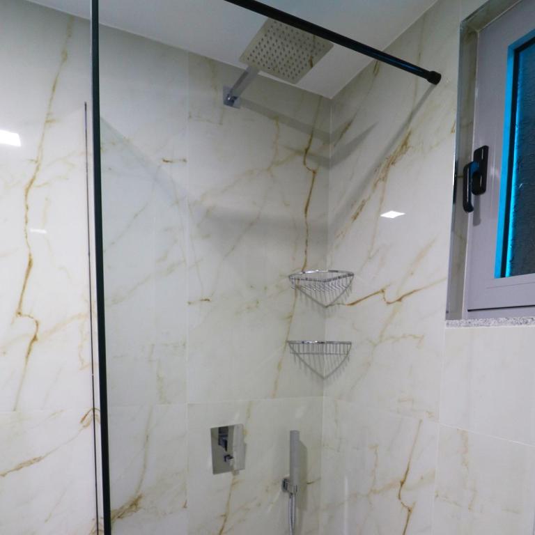 Koupelna v ubytování Memi Hotel