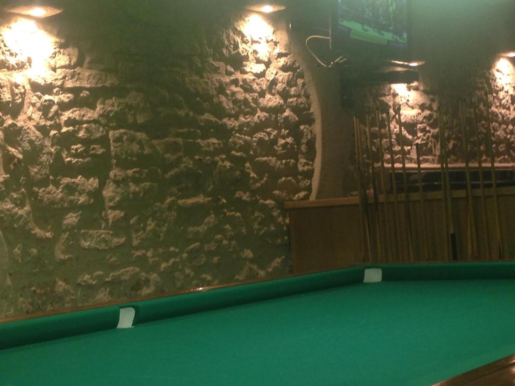 Biliár nebo kulečník v ubytování Hotel Scandola