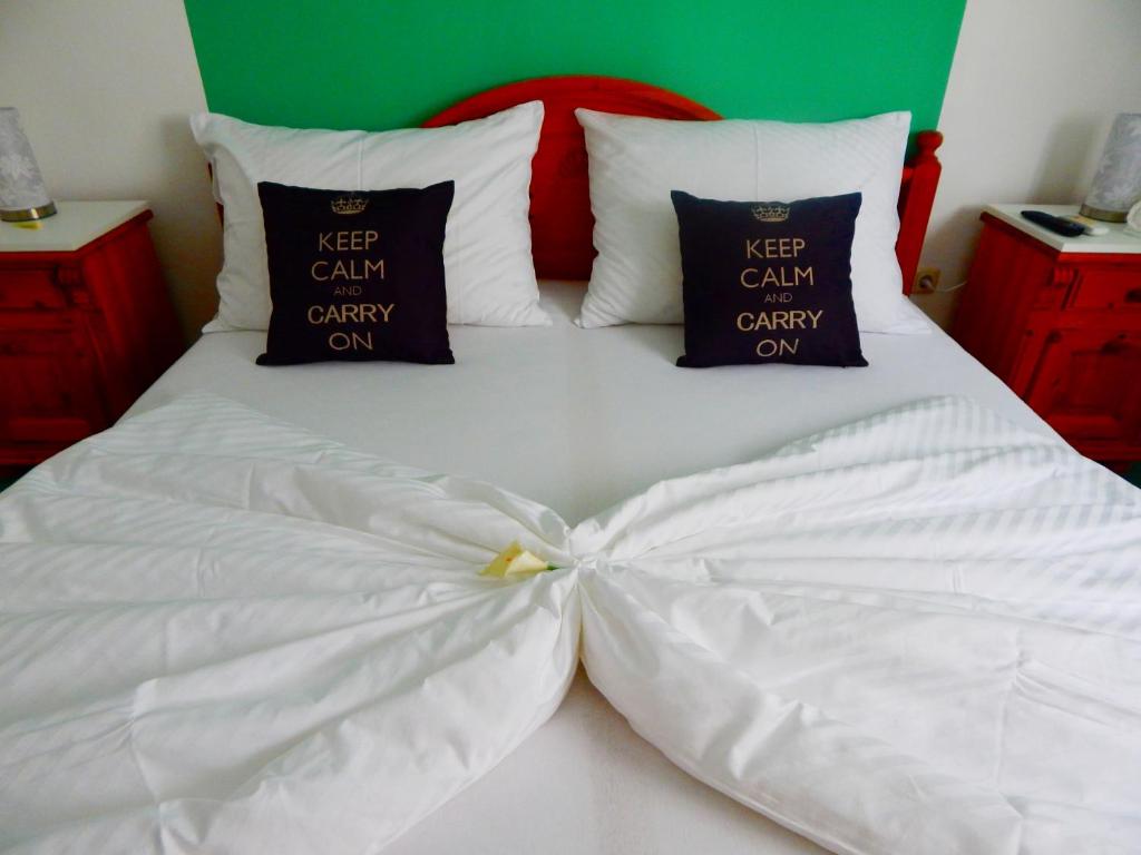 Łóżko lub łóżka w pokoju w obiekcie Apartments & Rooms Marinka