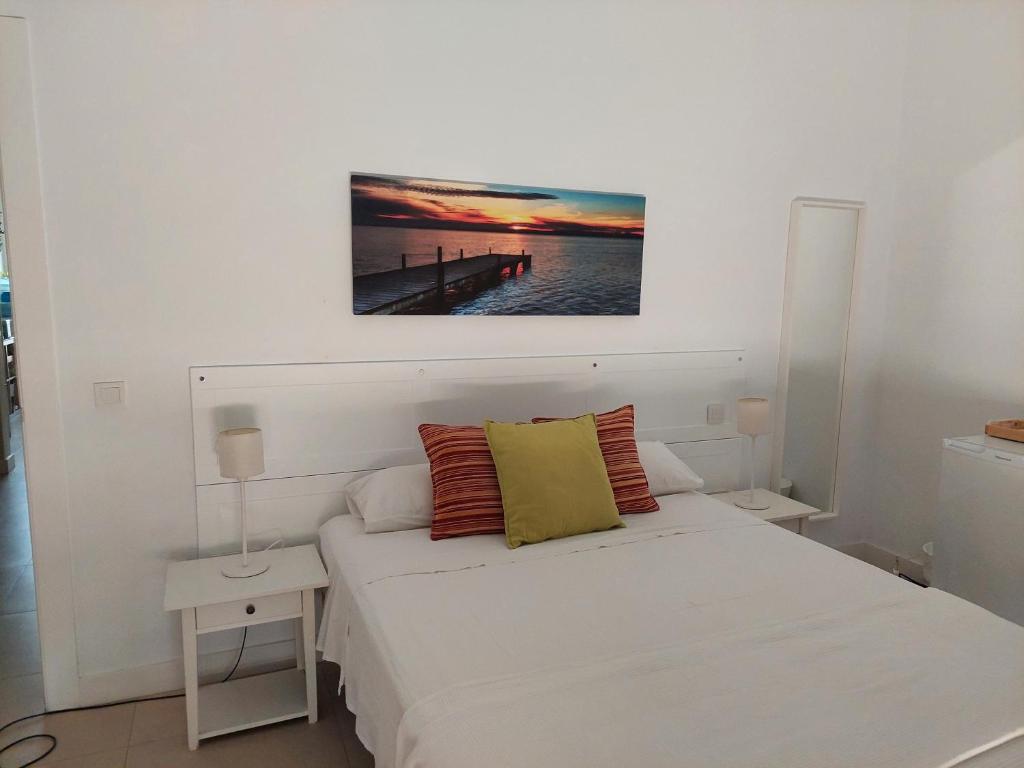 Posteľ alebo postele v izbe v ubytovaní Casa Oliva 52