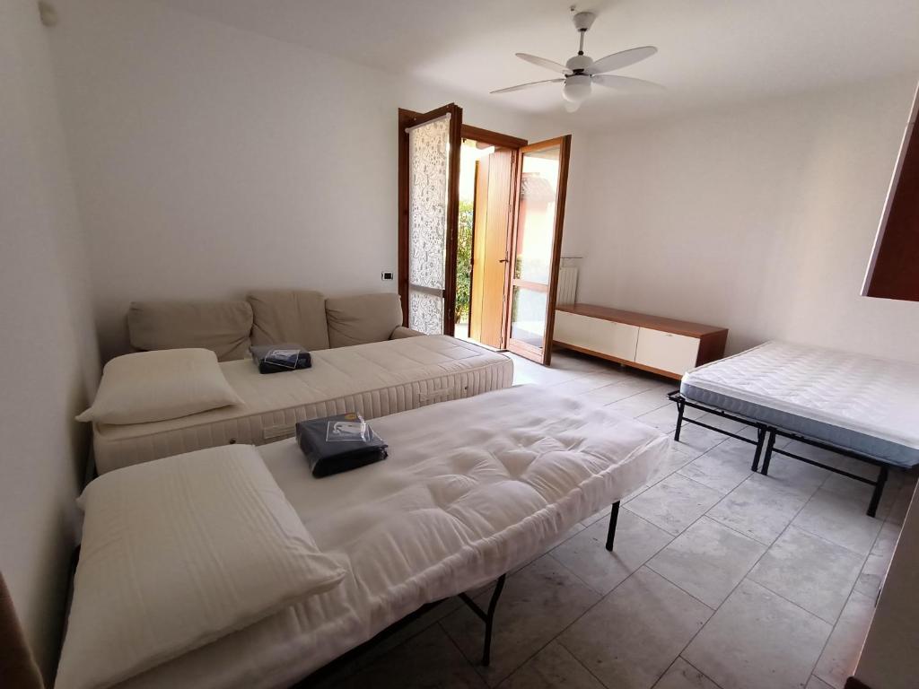 Кровать или кровати в номере Casa Ela Città Alta Hub