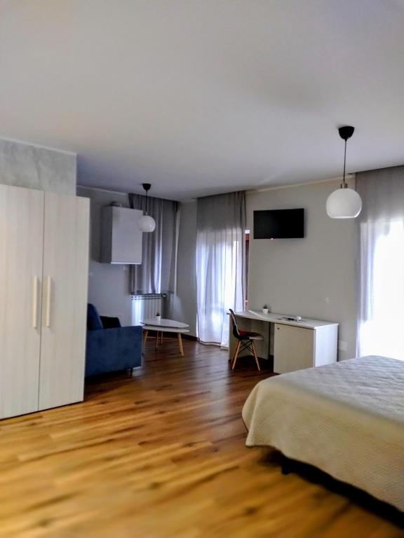 Postel nebo postele na pokoji v ubytování B&B Dimora Belvedere