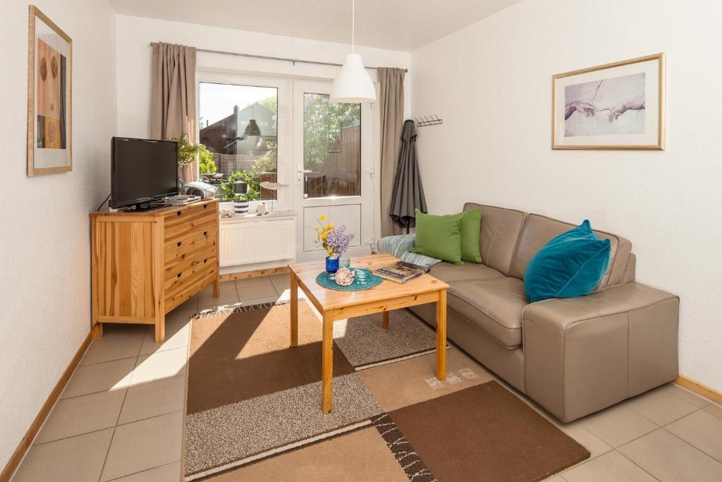 TV a/nebo společenská místnost v ubytování Reihenhaus, 35 qm, 1 Schlafzimmer