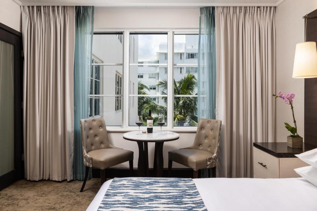 Ein Bett oder Betten in einem Zimmer der Unterkunft The Palms Hotel &amp; Spa