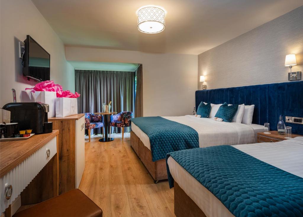 Postel nebo postele na pokoji v ubytování Arklow Bay Hotel