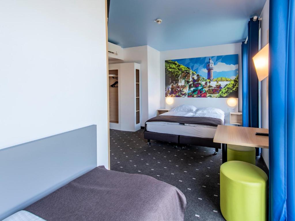 Postel nebo postele na pokoji v ubytování B&B Hotel Neu-Ulm
