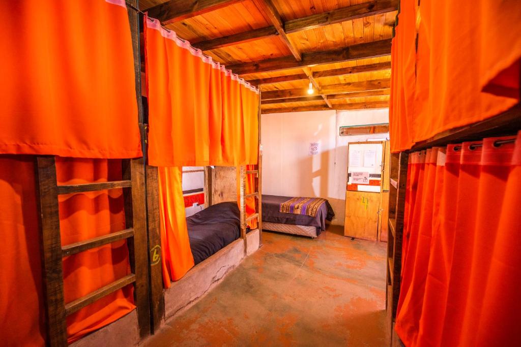 Postel nebo postele na pokoji v ubytování Casa Voyage Hostel