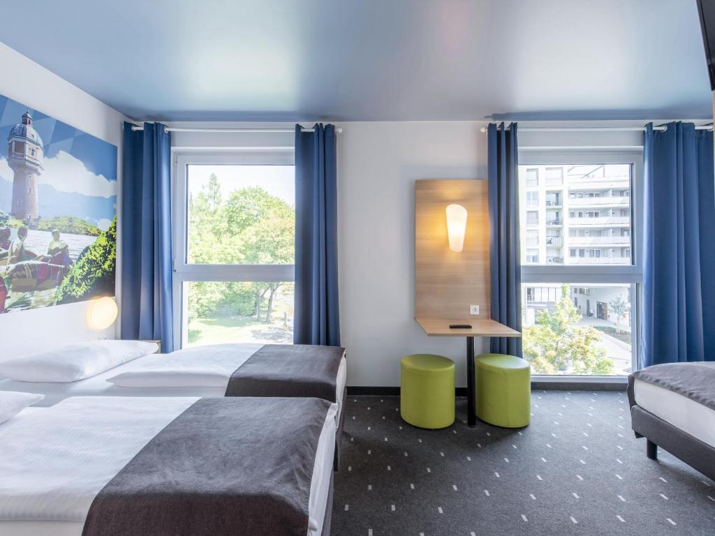 Postel nebo postele na pokoji v ubytování B&B Hotel Neu-Ulm
