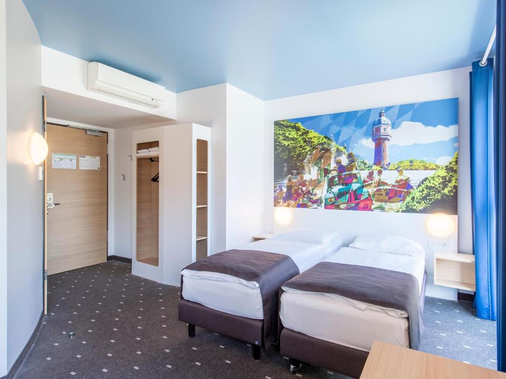 Postel nebo postele na pokoji v ubytování B&B Hotel Neu-Ulm