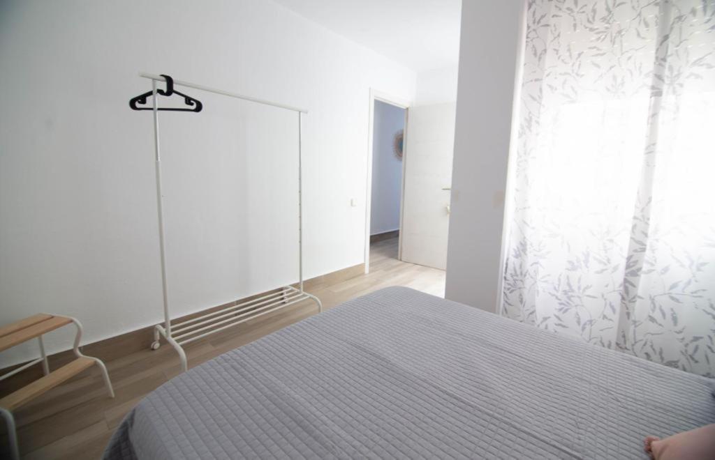 A bed or beds in a room at Barbate Playa