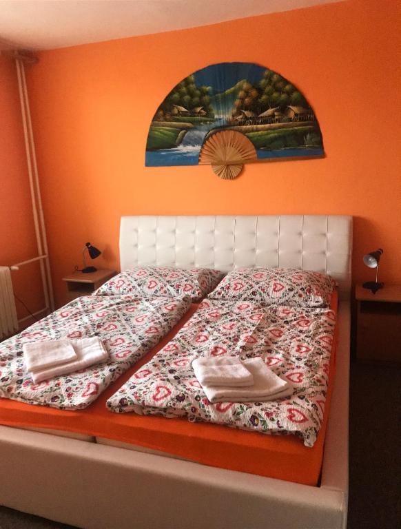 Postel nebo postele na pokoji v ubytování Housing HELLA
