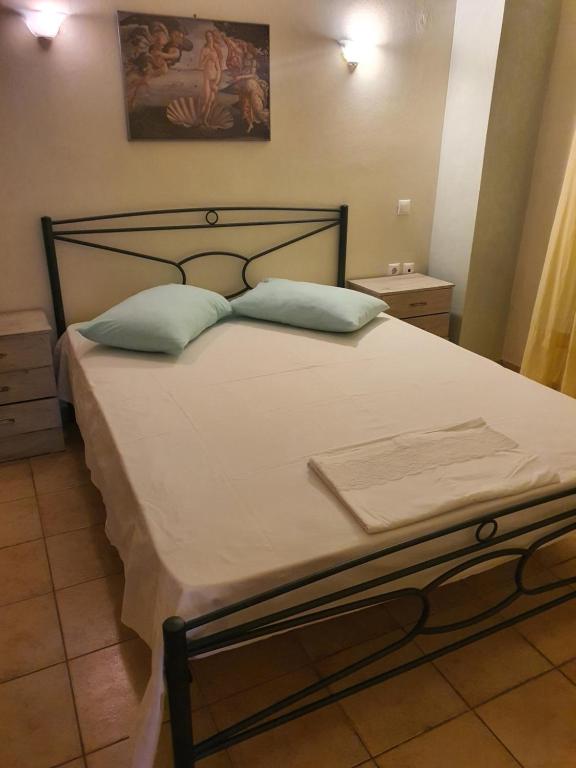 Postel nebo postele na pokoji v ubytování Σπίτι με θέα