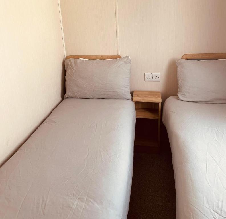 Postel nebo postele na pokoji v ubytování Luxury caravan - coopers beach