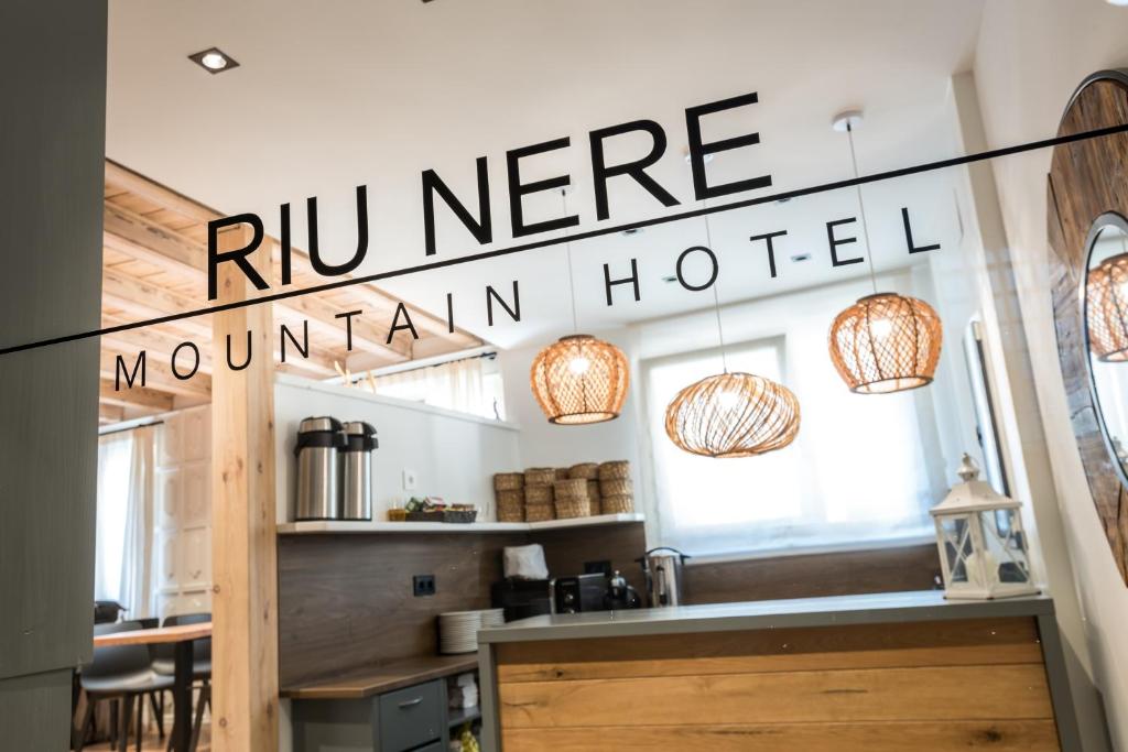 Um certificado, prémio, placa ou documento mostrado em Riu Nere Mountain Hotel