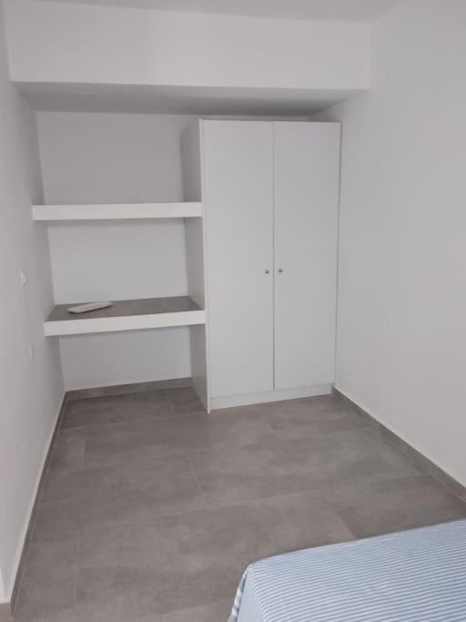 Postel nebo postele na pokoji v ubytování AFRODITE