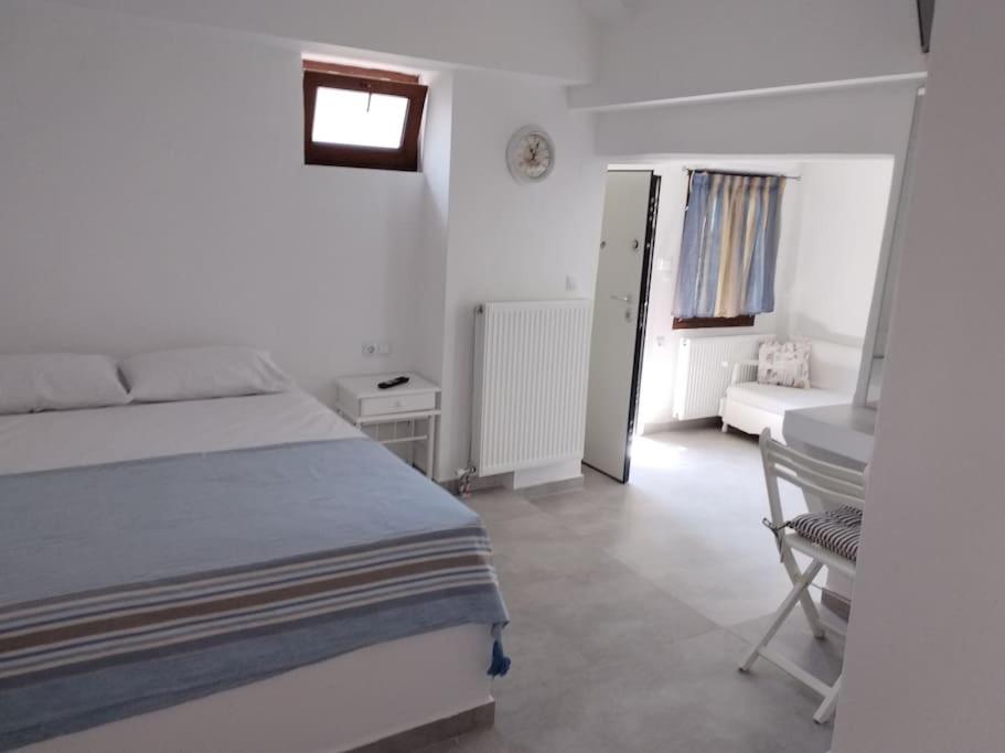 Postel nebo postele na pokoji v ubytování AFRODITE
