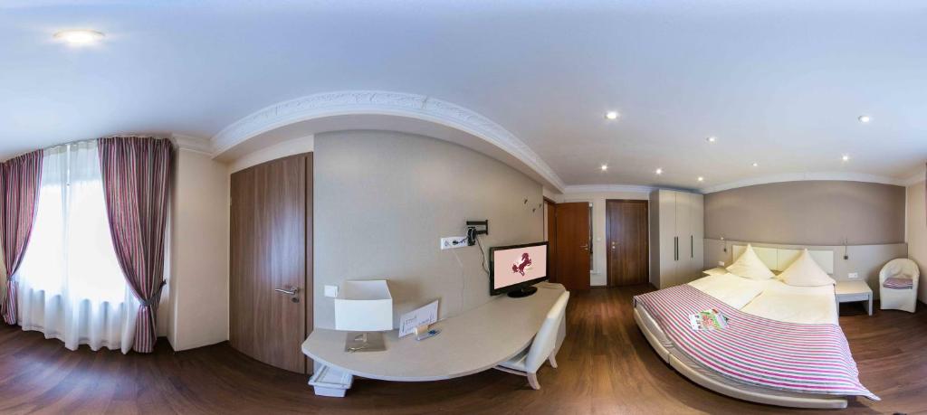 Hotel Il Cavallino - Habitación Cuádruple