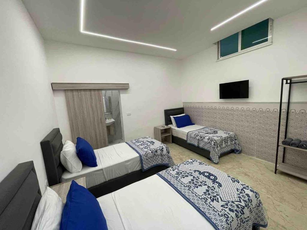 Postel nebo postele na pokoji v ubytování Zaman Ya Zaman Boutique Hotel