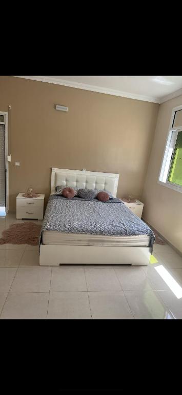 Postel nebo postele na pokoji v ubytování Maison vue mer Al Hoceïma
