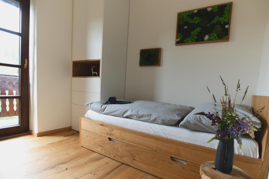 Postel nebo postele na pokoji v ubytování Strunzova pila - wellness
