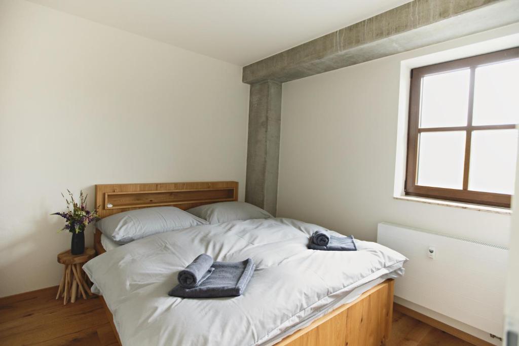 Postel nebo postele na pokoji v ubytování Strunzova pila - wellness