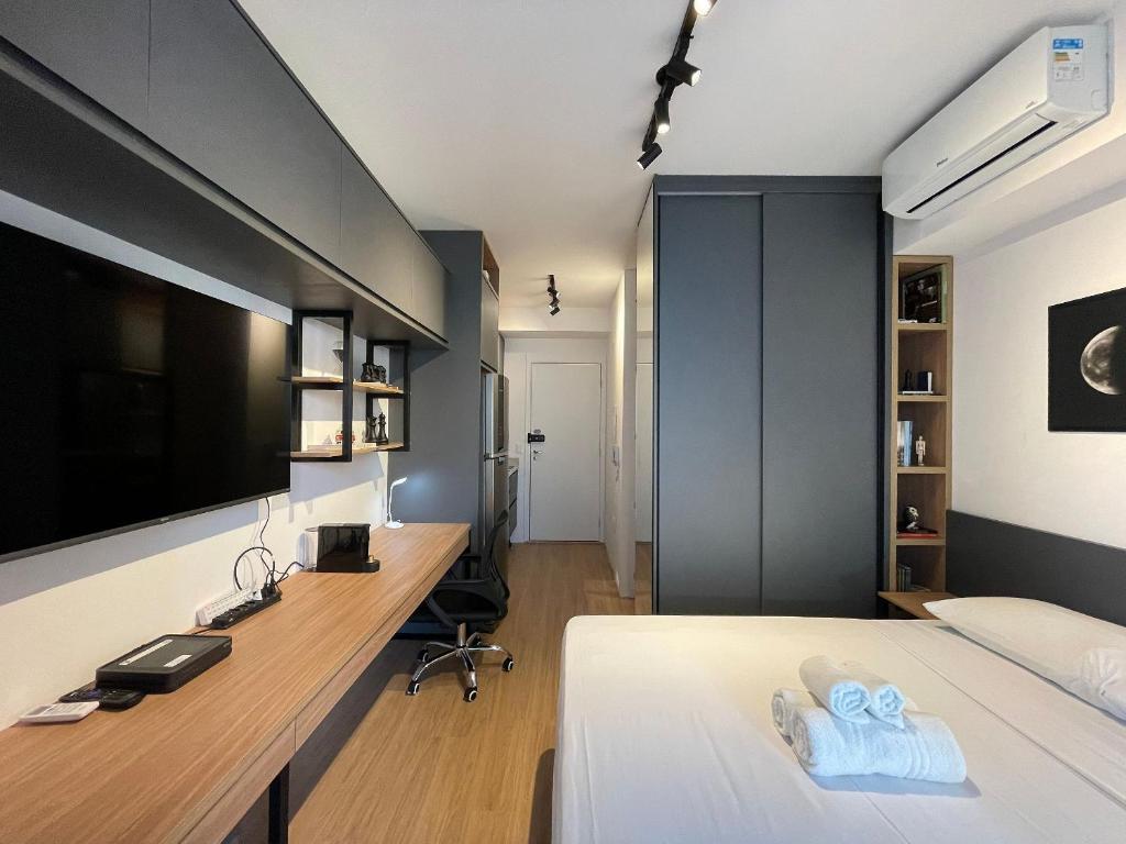 Ένα ή περισσότερα κρεβάτια σε δωμάτιο στο Go Vila Mariana - Studios por temporada