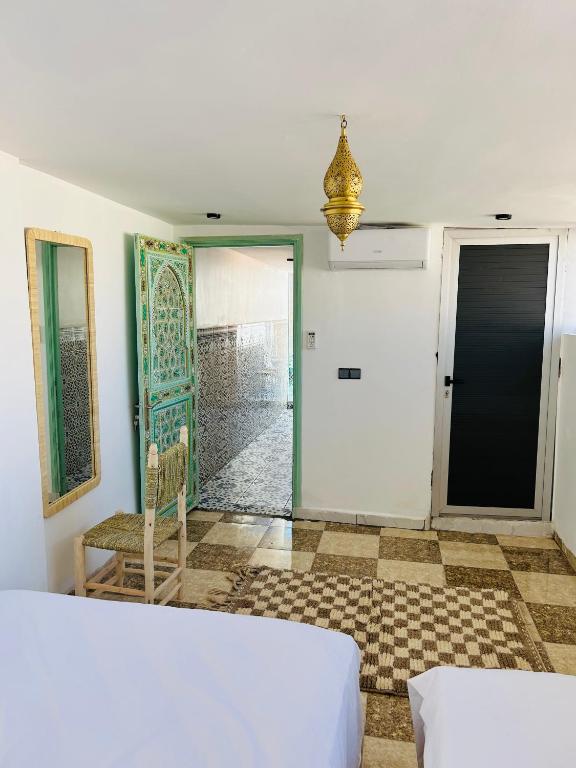 Postel nebo postele na pokoji v ubytování Riad Cascada