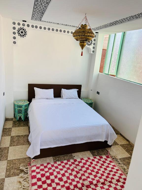 Postel nebo postele na pokoji v ubytování Riad Cascada
