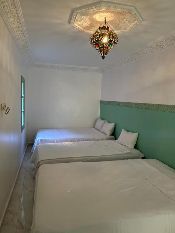 Postel nebo postele na pokoji v ubytování Riad Cascada