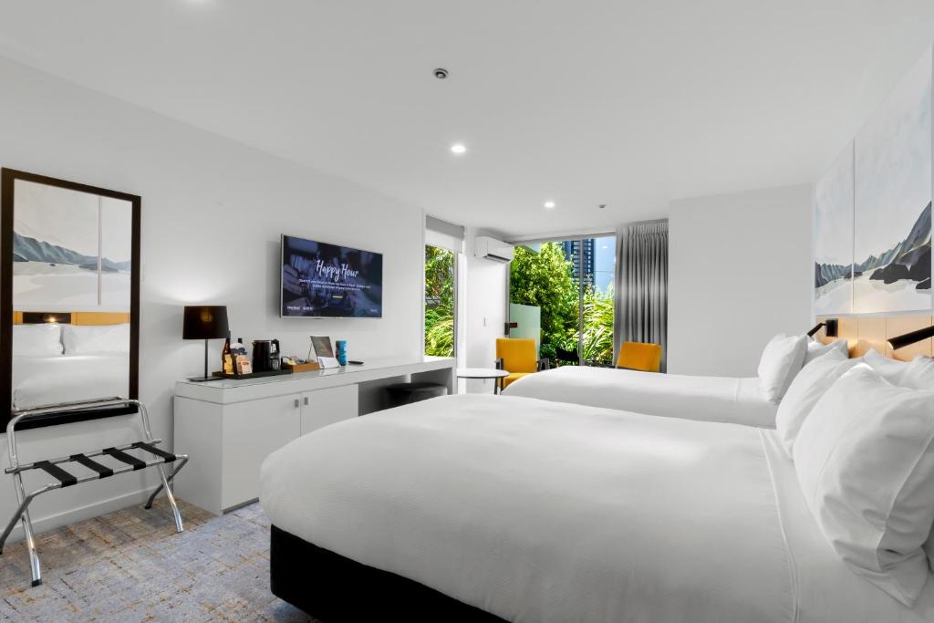 Postel nebo postele na pokoji v ubytování Scenic Suites Queenstown