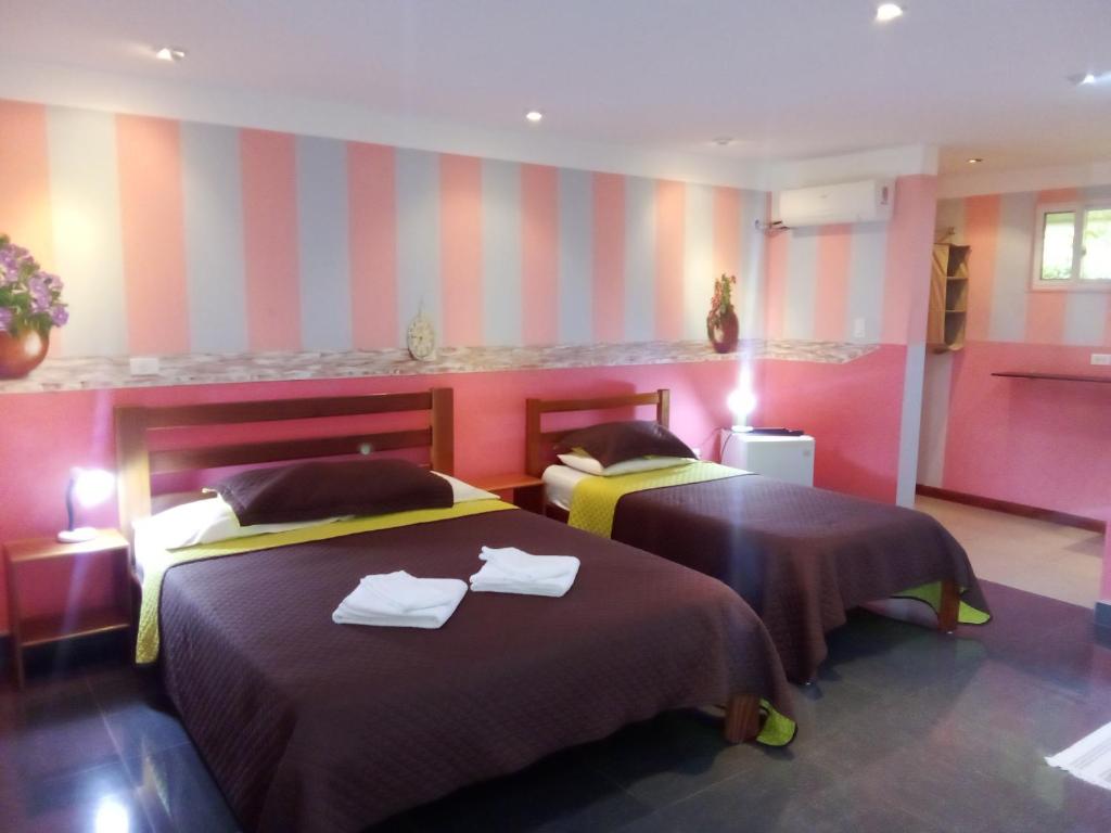Postel nebo postele na pokoji v ubytování Residence Las Lajas